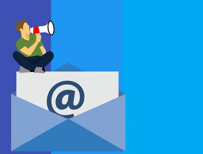 Person with megaphone sitting on an email